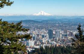 Downtown Portland, Oregon with Mount Hood in the background as seen from the Pittock Mansion viewpoint.